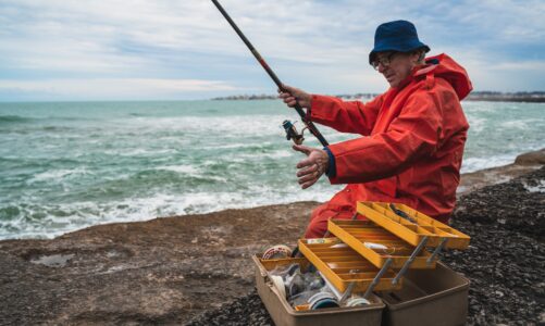 Old man fishing in the sea.
