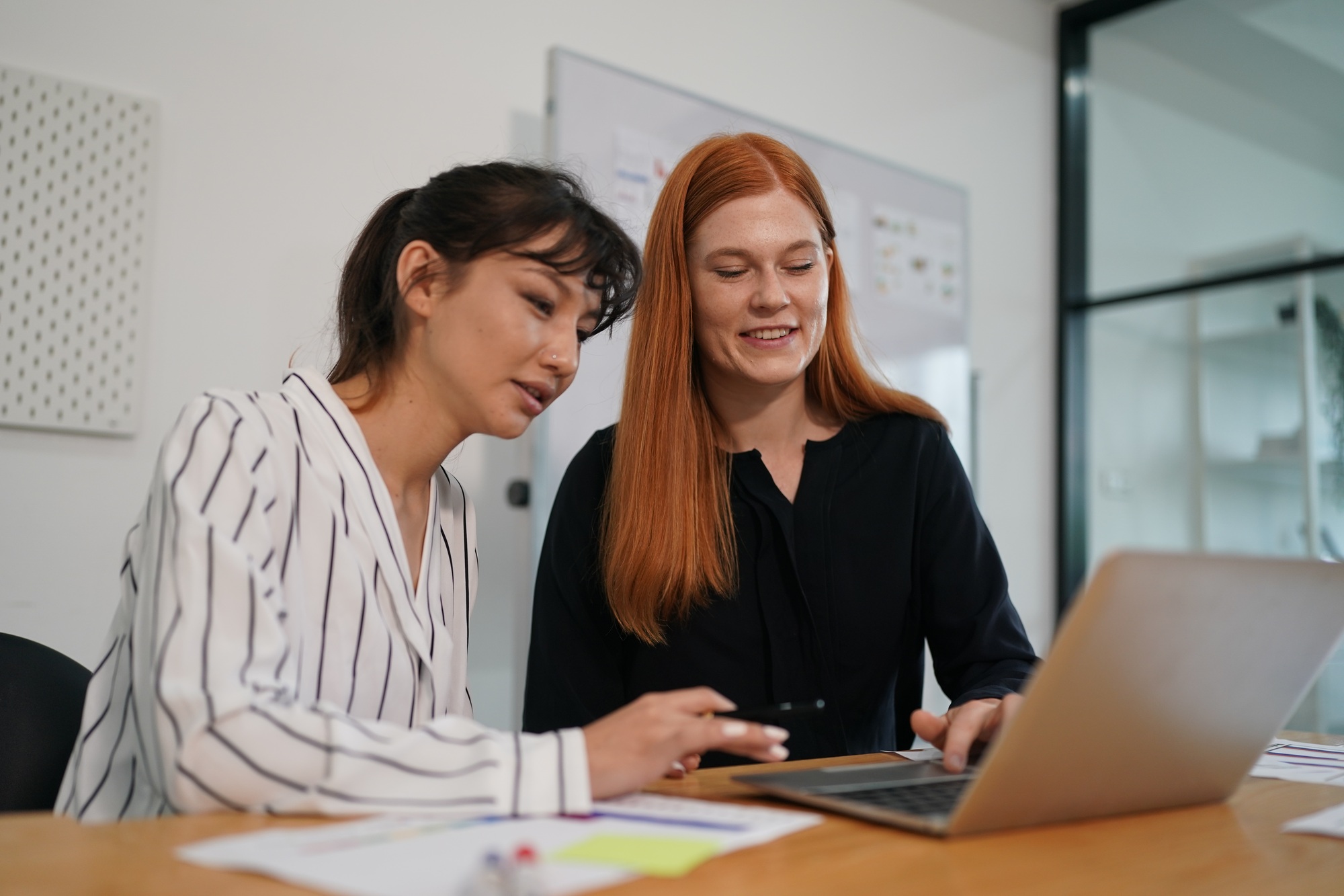 Young businesswoman working in office